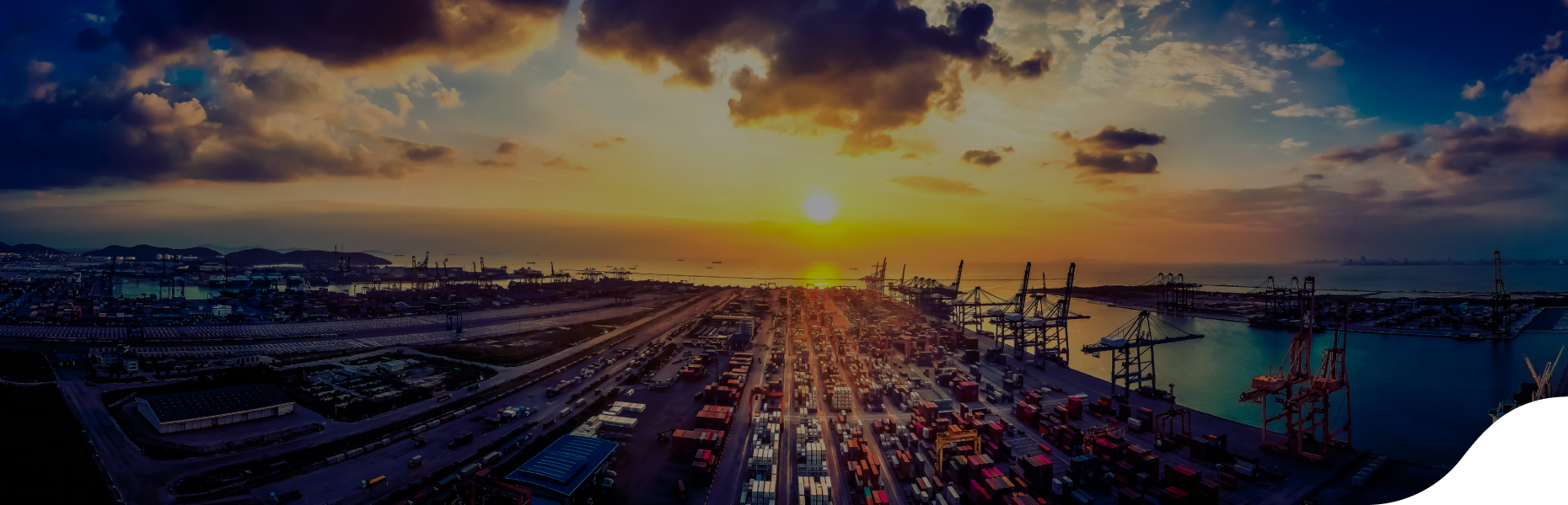 shipping containers at sunset